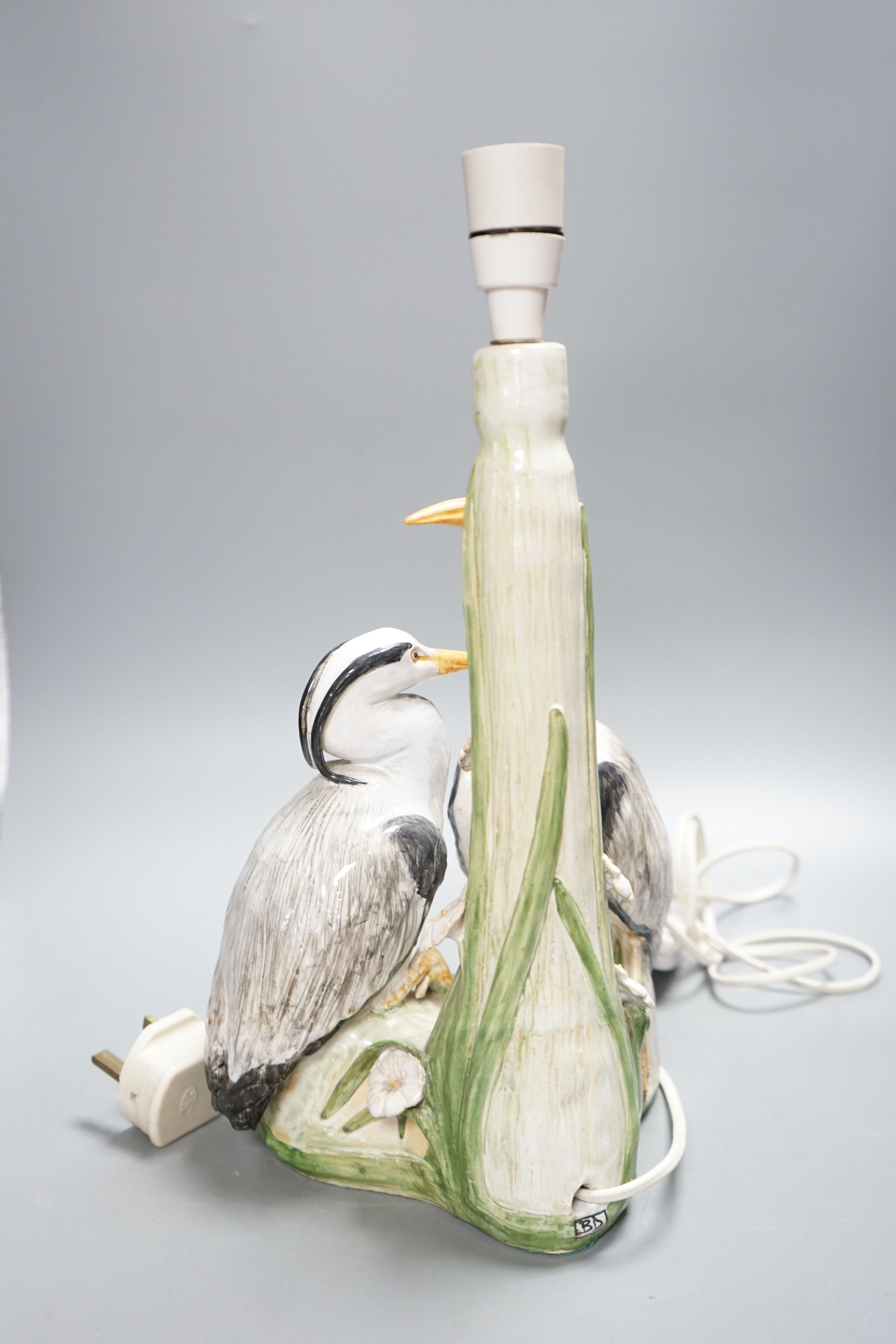 A tin glazed pottery twin heron table lamp, by Brenda Dennis 33cm